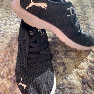 PUMA slip on shoes in black geometric print